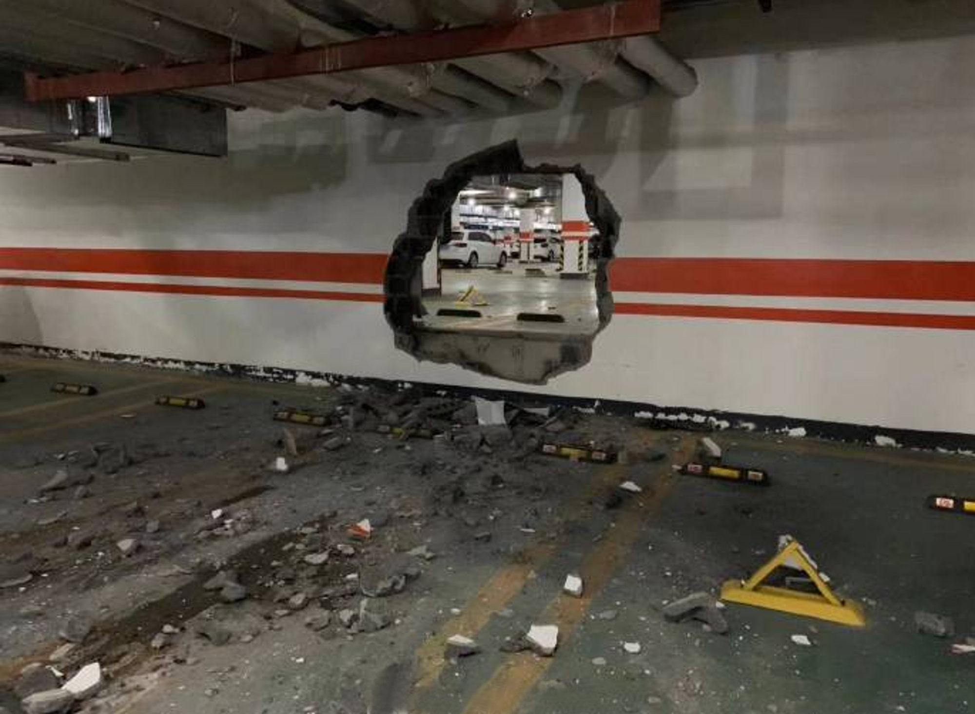 Read more about the article Out-Of-Control Car Crashes Through Car Park Wall