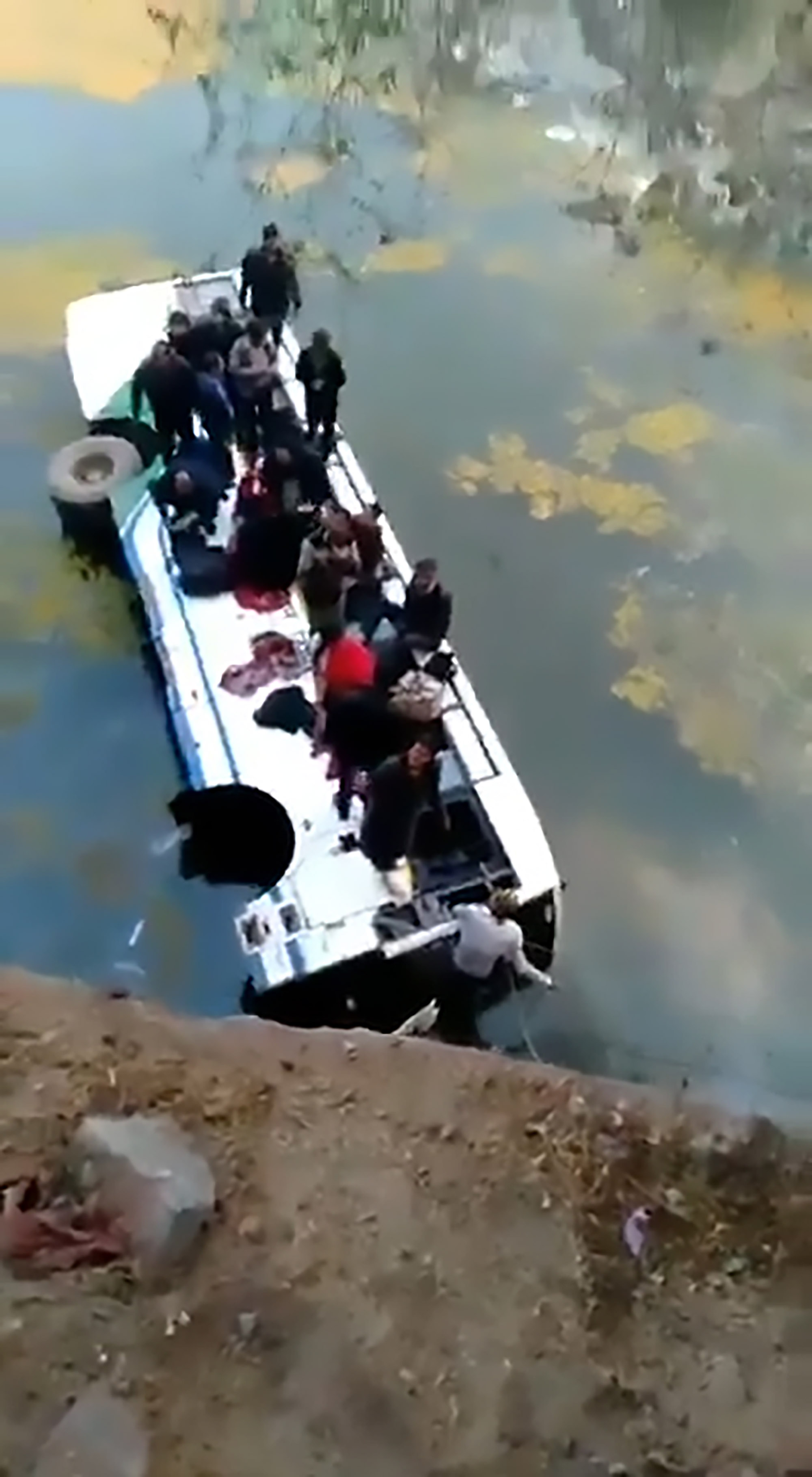 Read more about the article Passengers Stranded As Bus Falls 25 Feet Into Pond