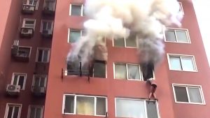 Read more about the article Woman In Undies Hangs Outside 8th-Floor To Escape Blaze
