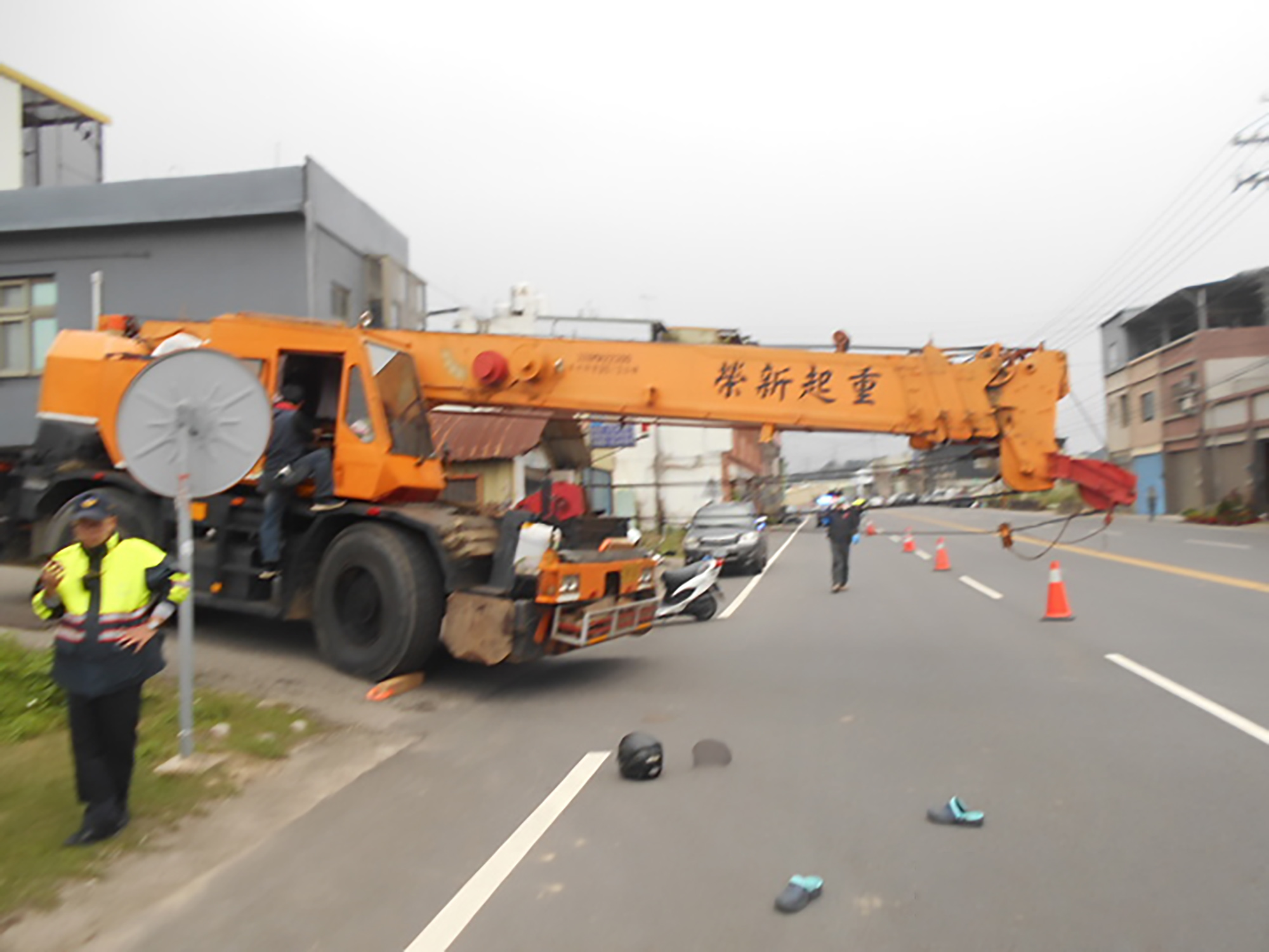 Read more about the article Scooterist Slits Throat On Crane Sticking Out Into Road