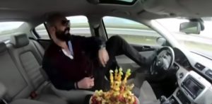 Read more about the article Man Steers Car With Feet While Eating Fancy Fruit