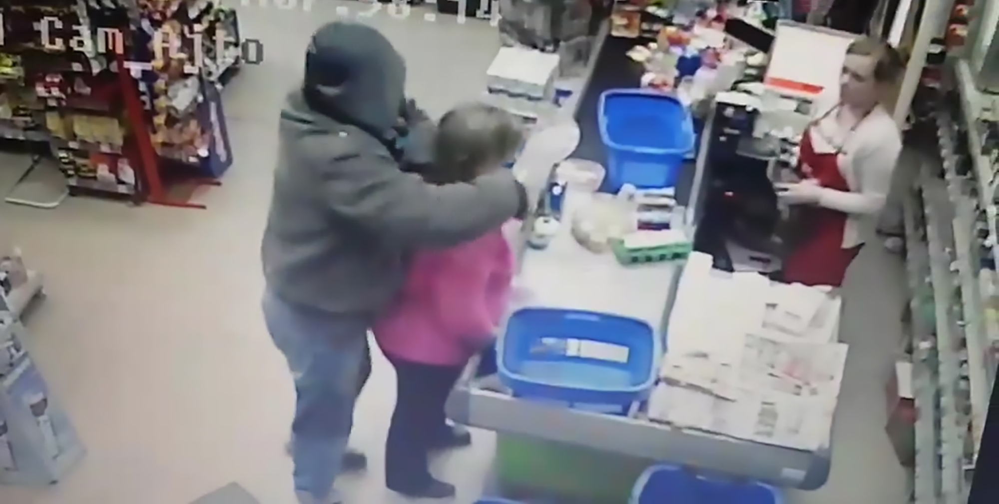 Read more about the article Hoodie Thug Puts Knife To Womans Neck In Shop Heist