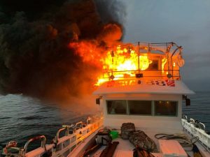 Read more about the article 30 Swim To Safety From Burning Boat off Bullocks Island