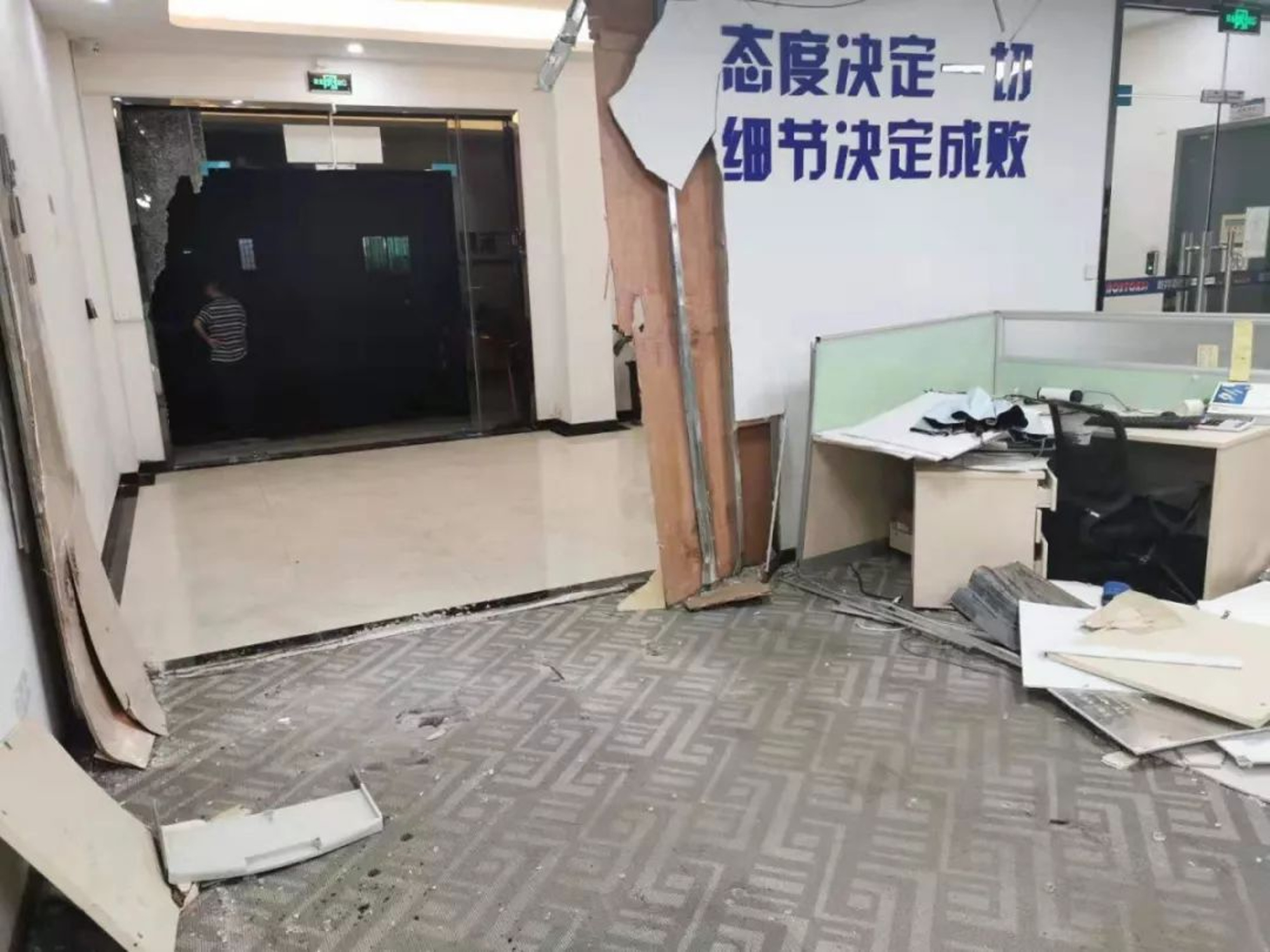 Read more about the article Bungling Woman Driver Shoots Through Wall Into Office