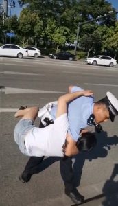 Read more about the article Traffic Cop Slams Woman To Ground Over 5-GBP Fine Row