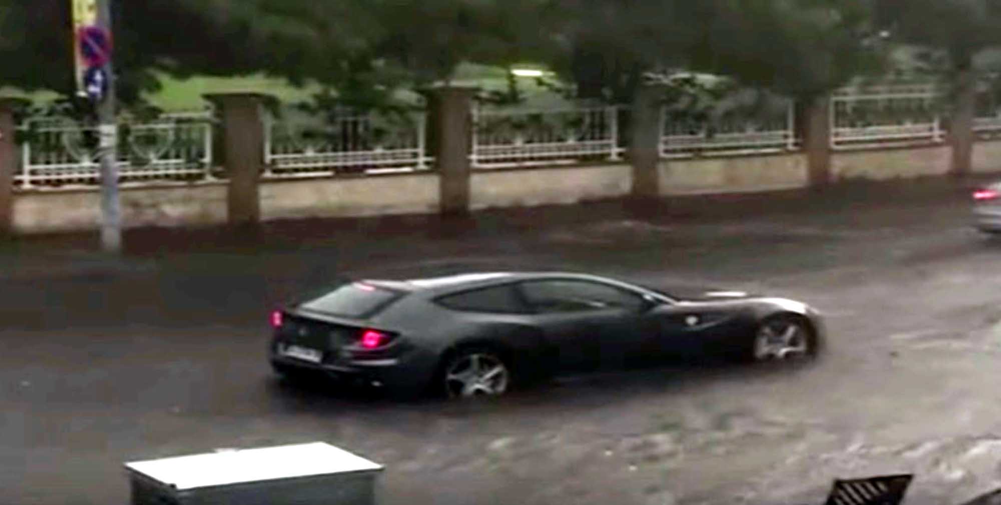 Read more about the article Luxury Ferrari Trapped In Flood As Motorists Watch On