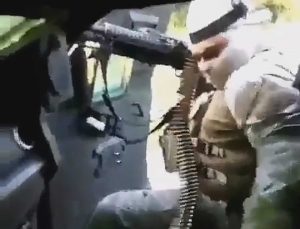 Read more about the article Moment Masked Cartel Thug Fires Machine Gun From Vehicle