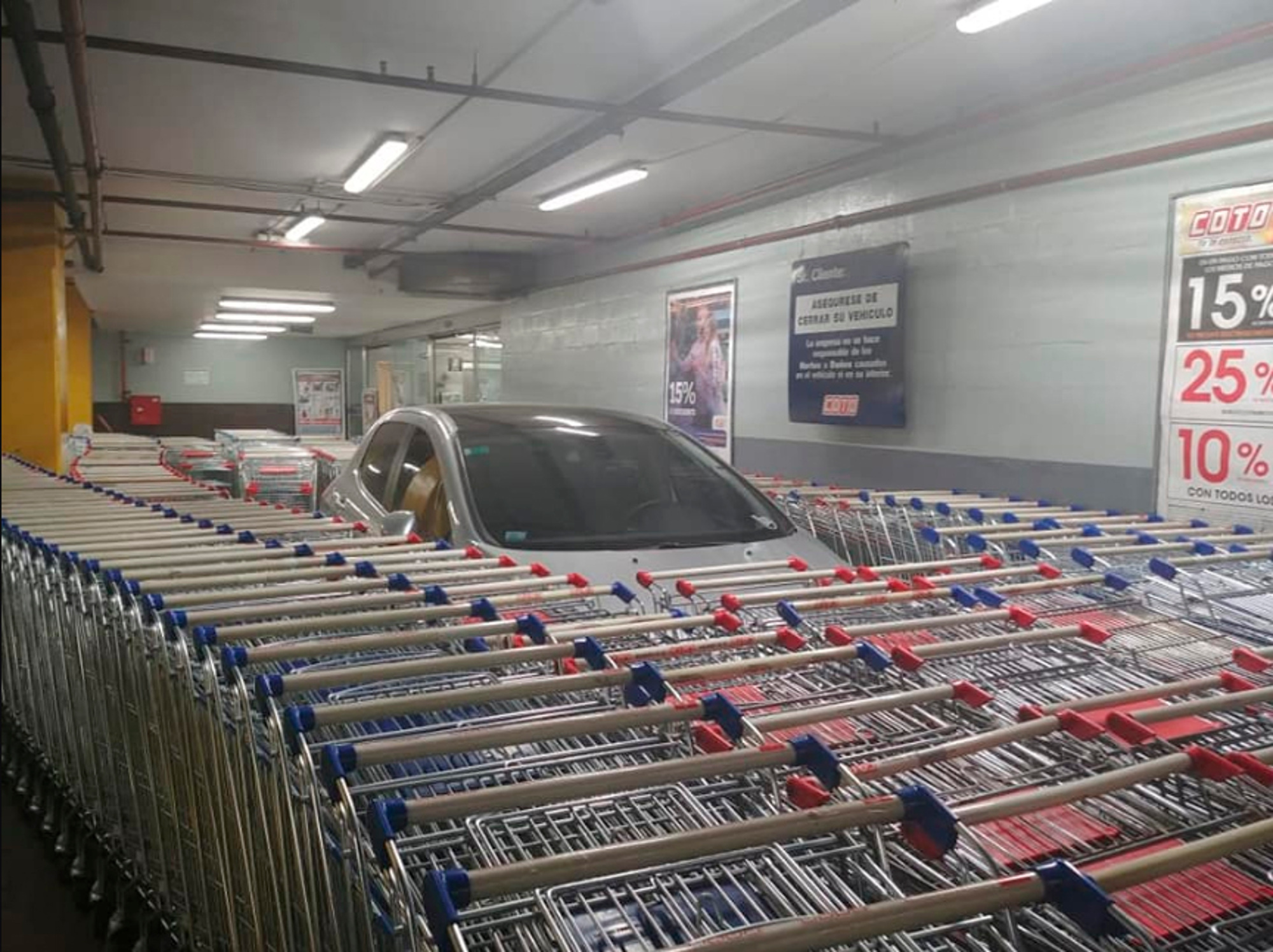 Read more about the article Workers Block In Badly-Parked Car With 100s Of Trolleys