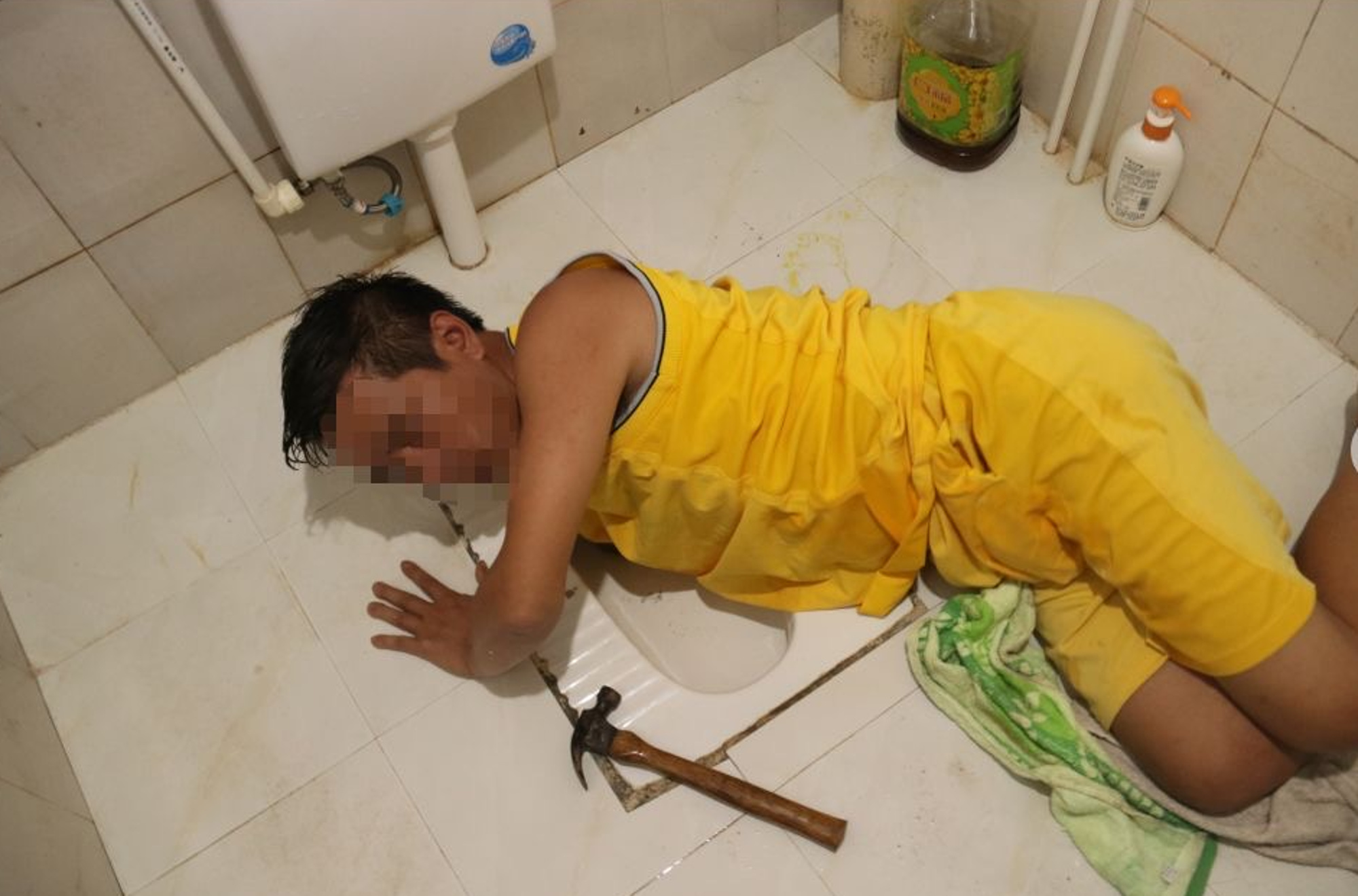 Read more about the article Man Hunting For Escaped Fish Traps Arm In Squat Toilet
