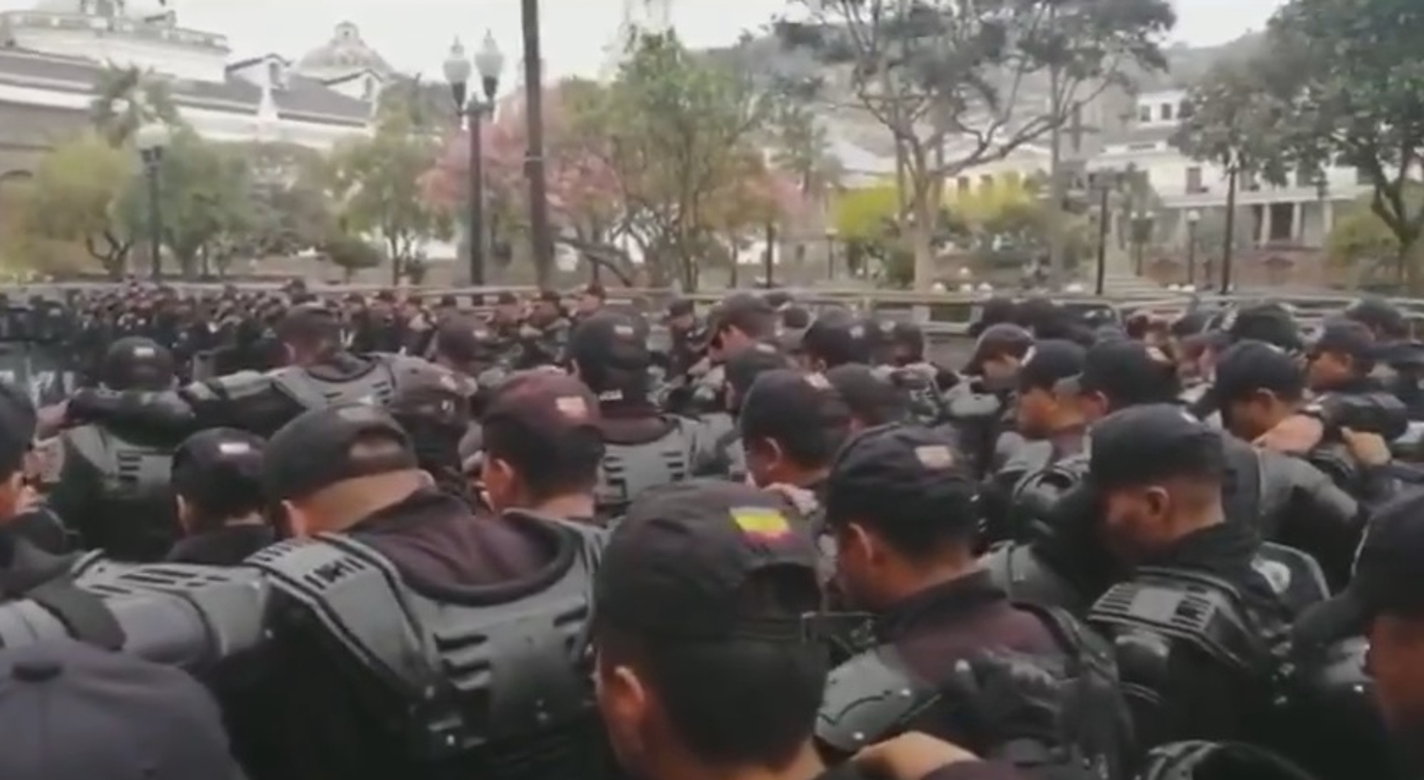 Read more about the article Ecuador Cops Pray In Riot Gear Before Gassing Activists