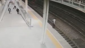 Read more about the article Jump On Tracks Woman Rescued Just Before Train Arrives