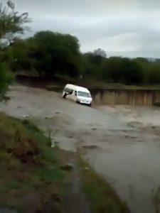 Read more about the article Taxi Swept Along South Africa River After Heavy Rains