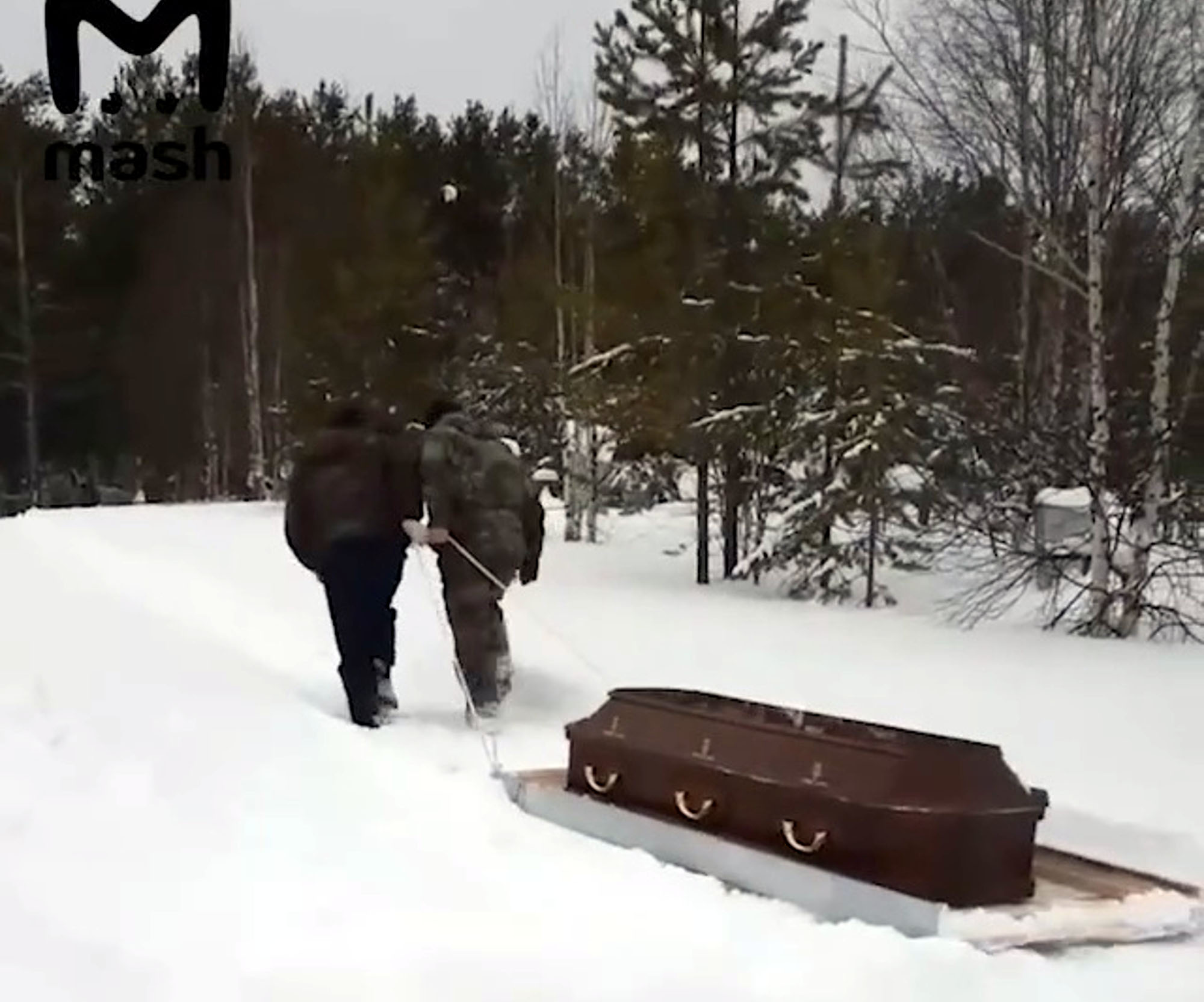 Read more about the article Mourners Forced To Drag Coffin On Sled Through Snow