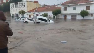 Read more about the article Cars Washed Down City Street In Devastating Spain Floods