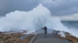 Read more about the article Massive Wave Knocks Reckless Biker Off His Feet