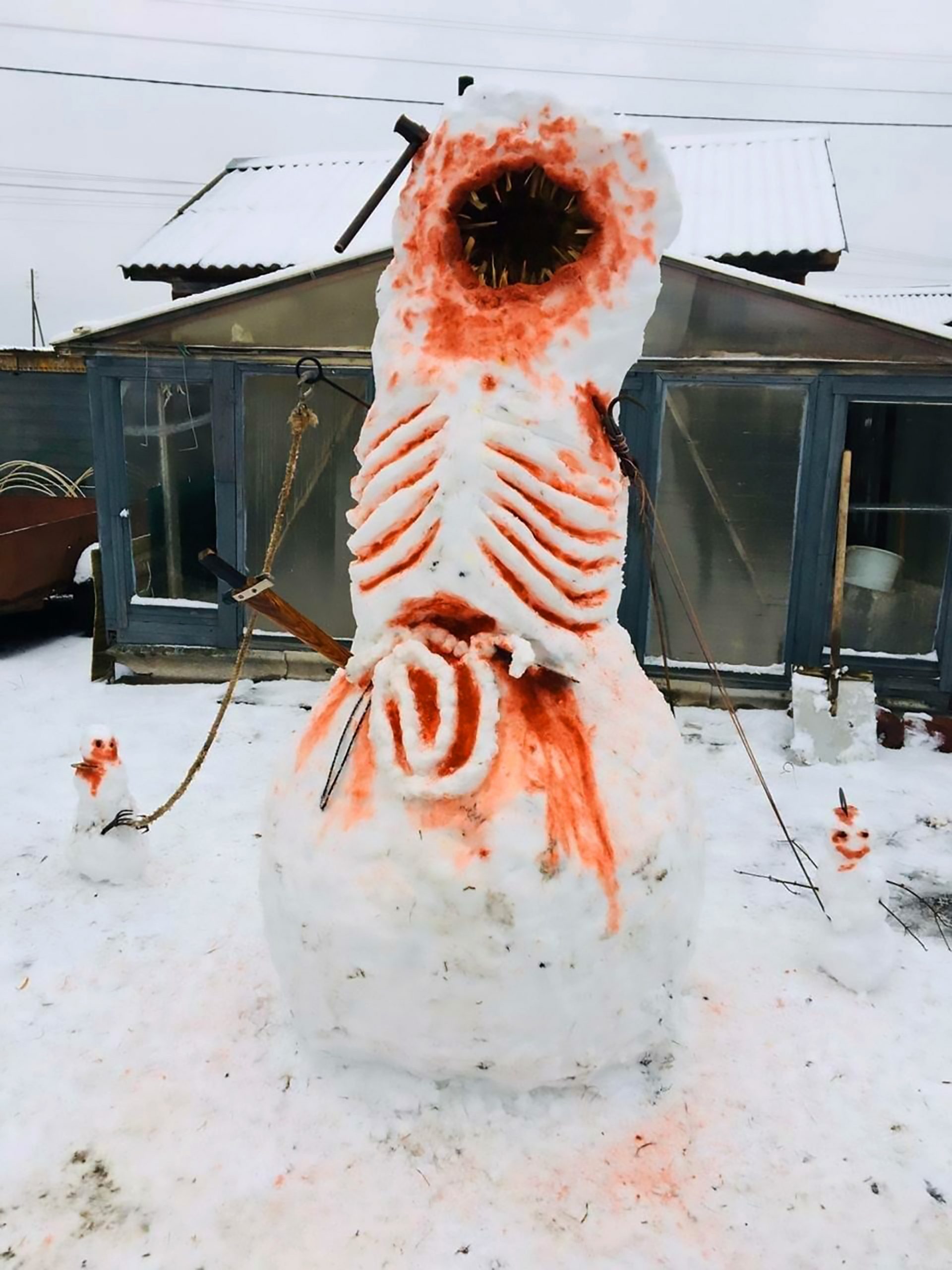 Fanged Monster Captured By Snowmen In Gory Snow Scene - ViralTab