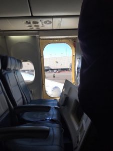 Read more about the article Plane Passenger Sees Smoke And Opens Emergency Exit