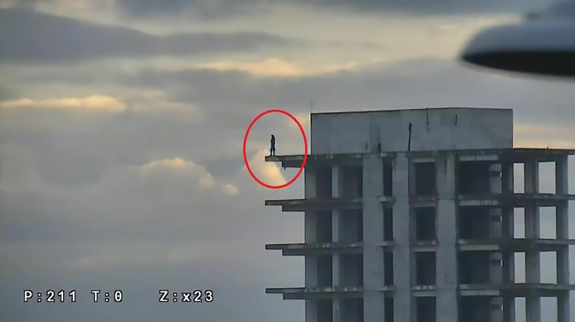 Read more about the article Cop Pulls Man From Edge Of Unfinished Tower Block Roof