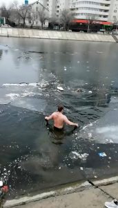 Read more about the article Man Plunges Into Icy River To Rescue Drowning Dog
