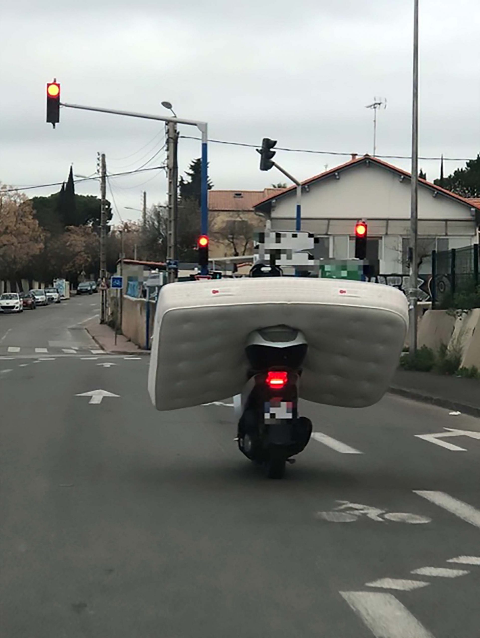 Read more about the article Frenchman Busted Carrying Huge Mattress On Scooter