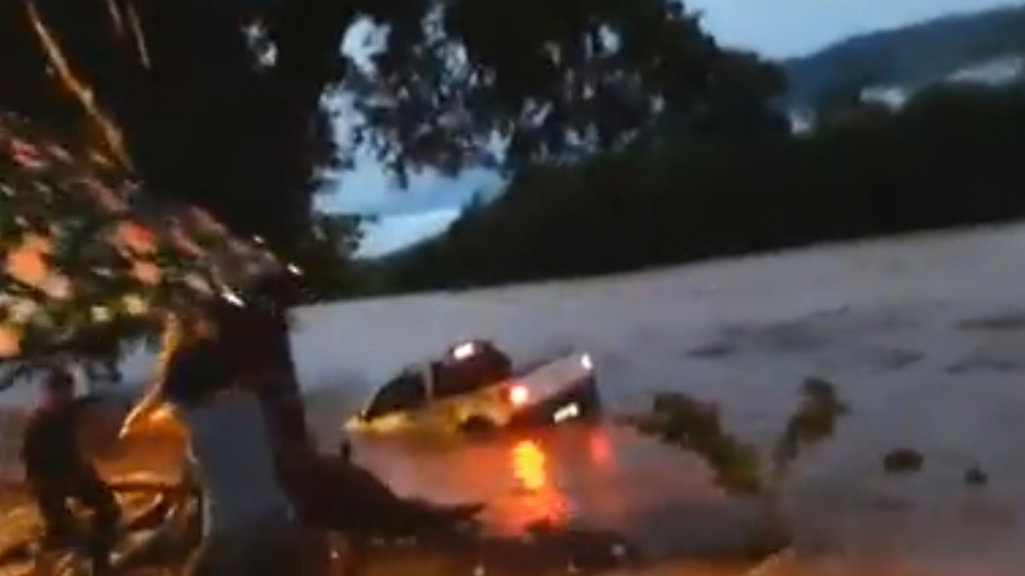 Read more about the article Driver Saved From Car Stuck In Flooded River