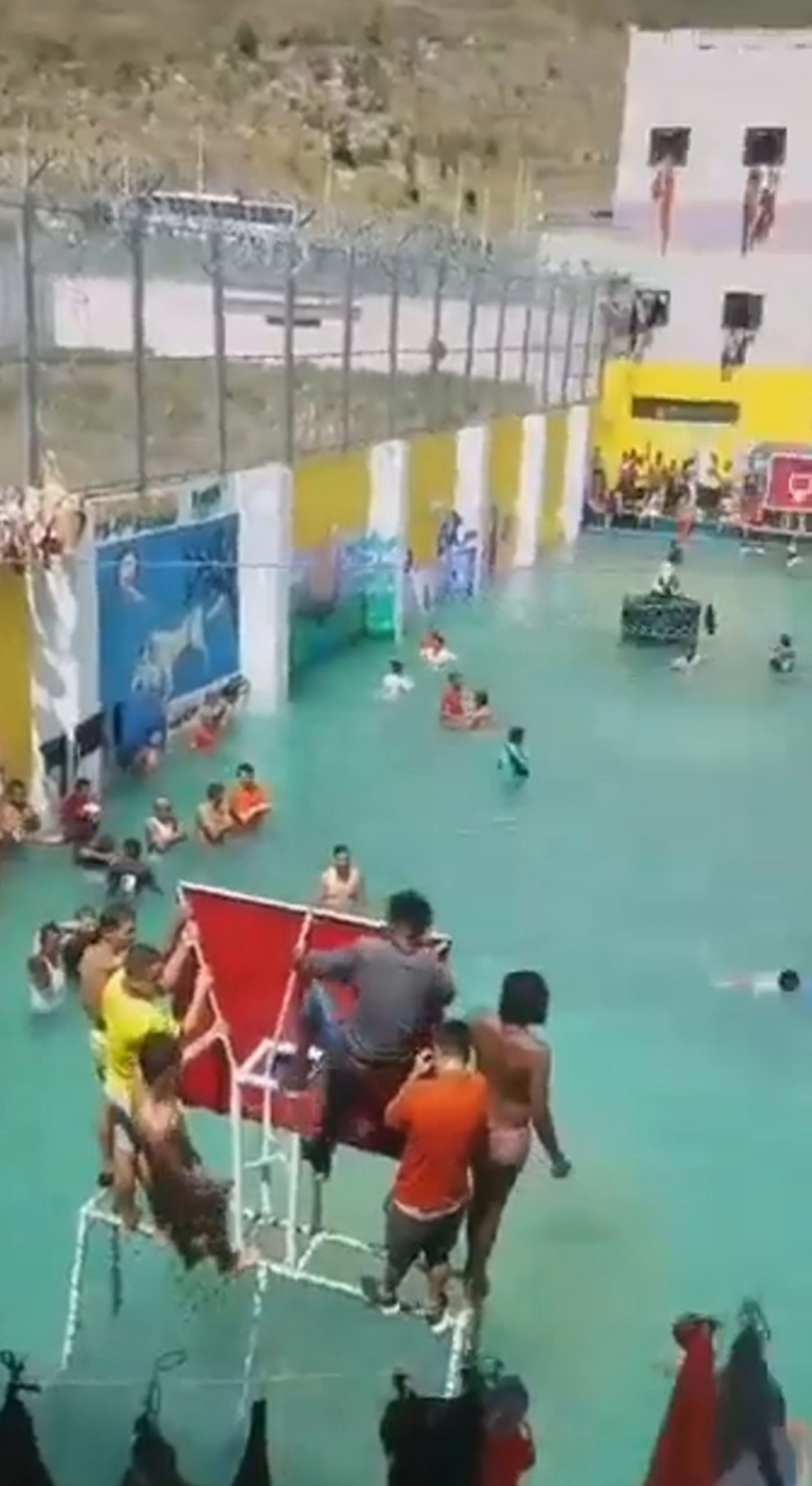Read more about the article Prisoners Swim In Huge Courtyard Pool After Rainstorms
