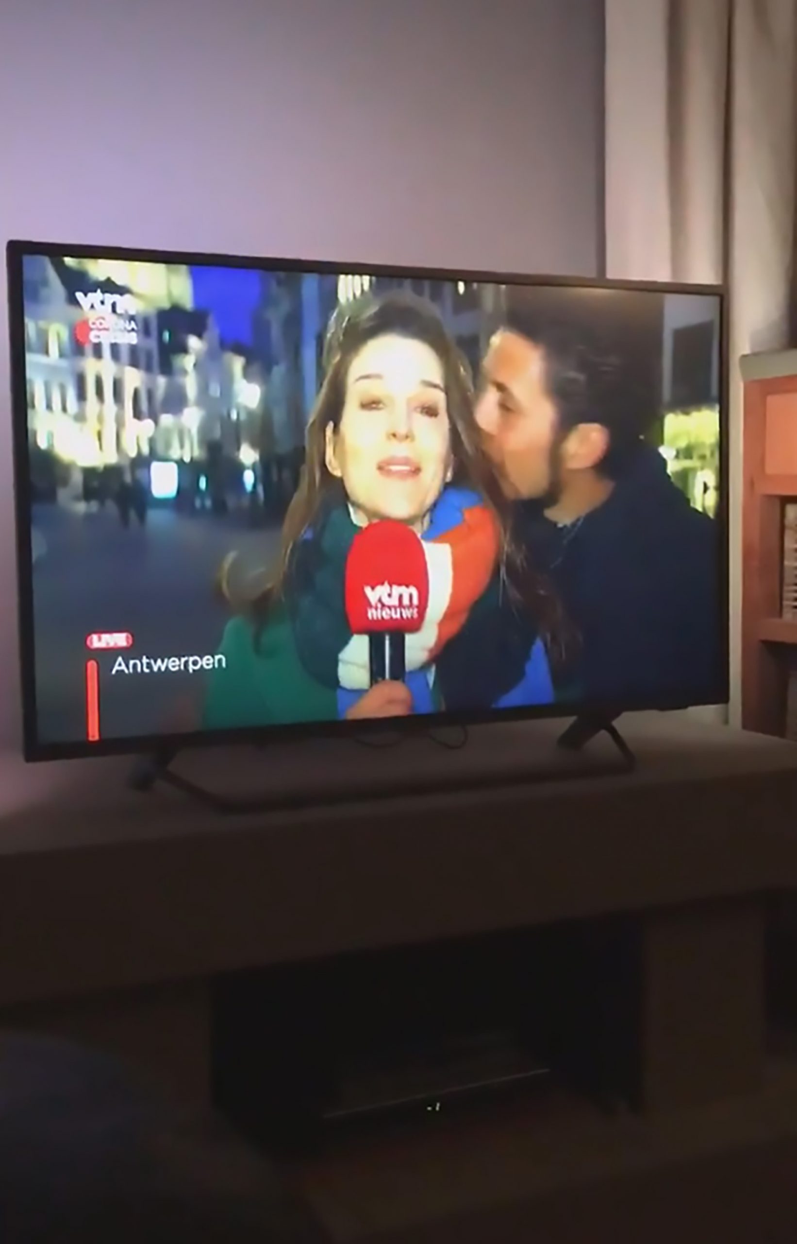 Read more about the article Perv Forces Kiss On Journo On Air During Coronavirus
