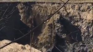 Read more about the article Chunk Of Land Falls Into Huge Hollow At Collapsed Mine