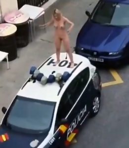 Read more about the article Naked Woman Climbs On Police Car In Spanish Lockdown