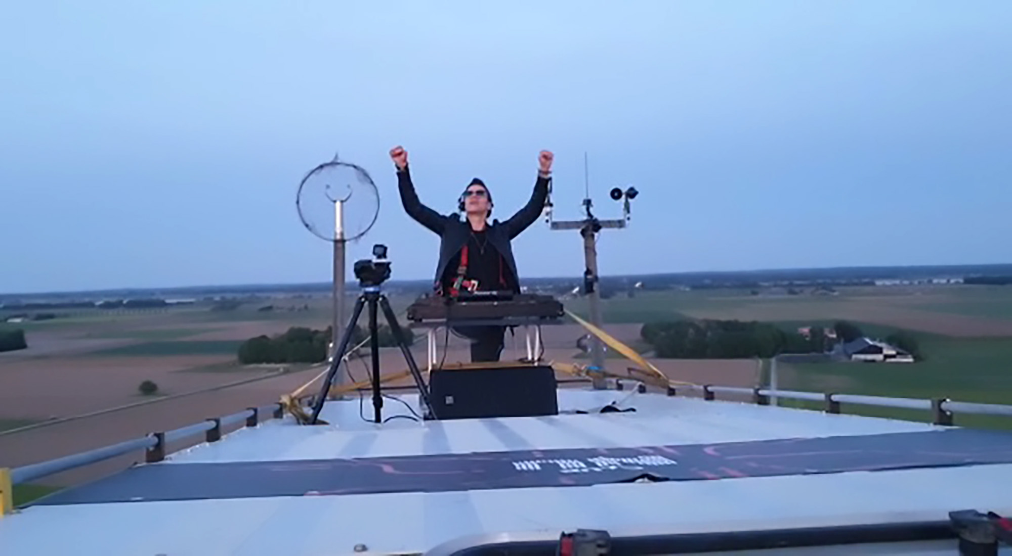 Read more about the article Social Distance Dutch DJ Spins Tunes On Top Of Windmill