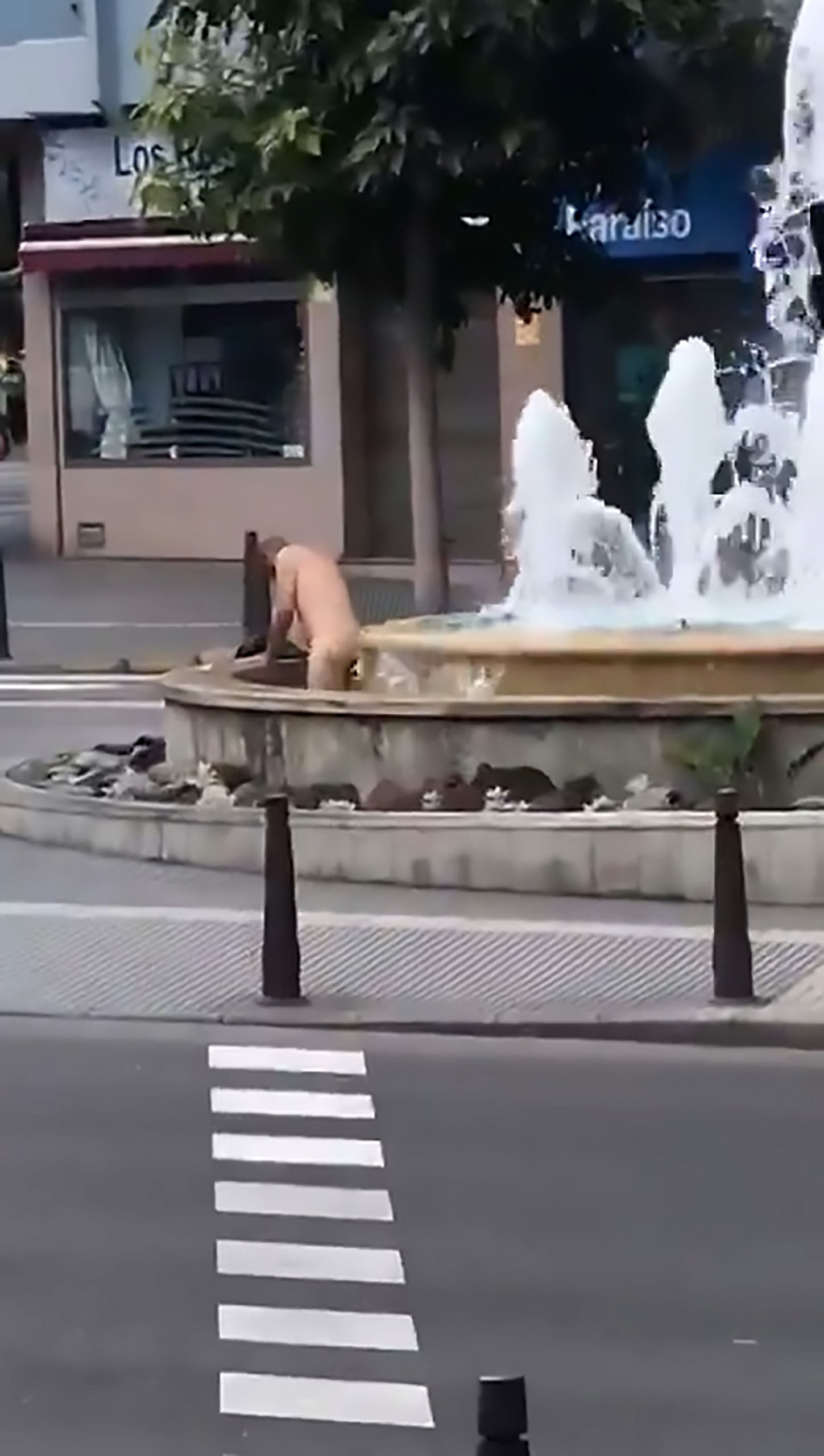Read more about the article Naked Man Takes Bath In Canary Island Fountain