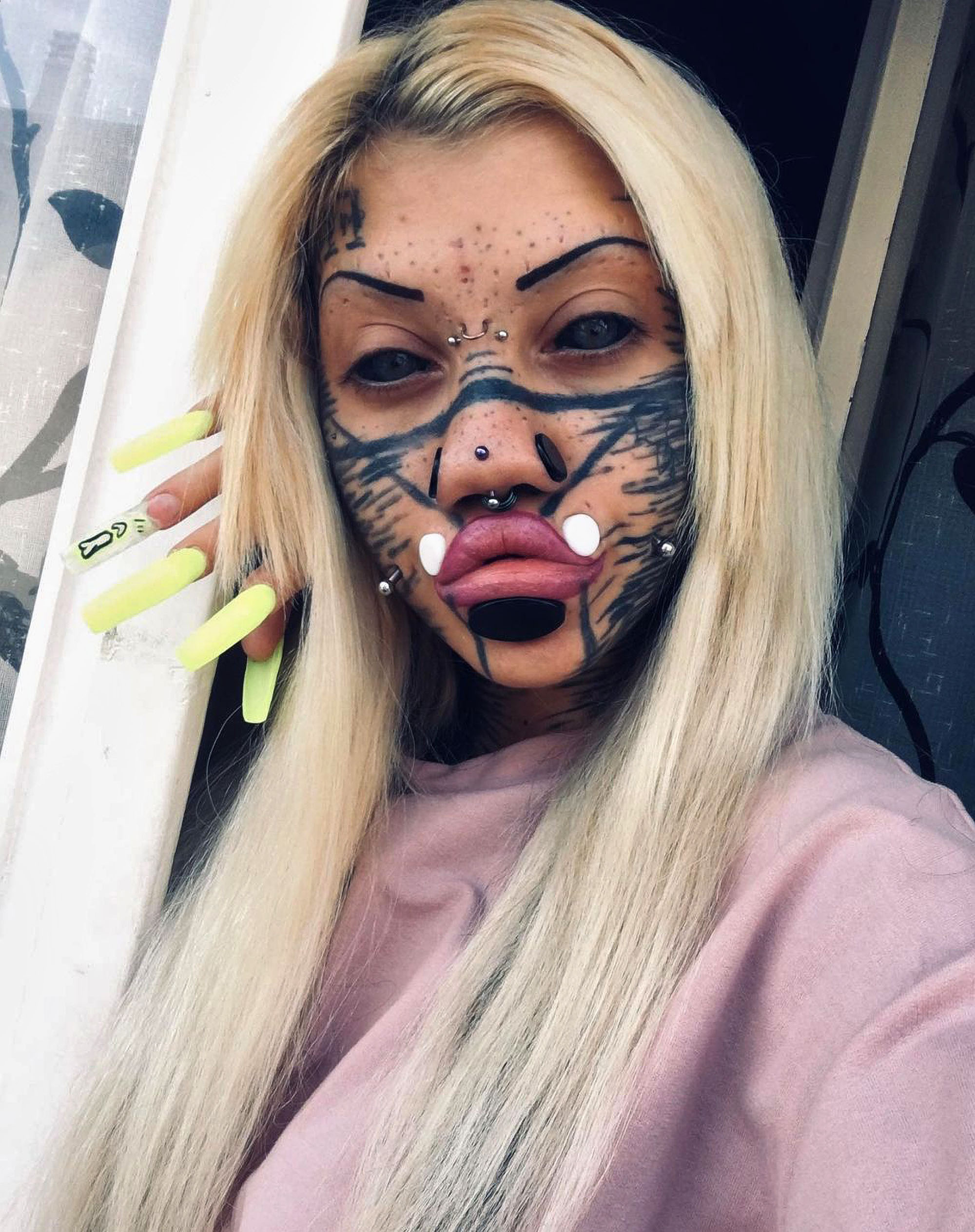 Read more about the article Teen Girl With Shocking Face Tattoo Goes Blonde And Wants Bigger Breasts To Be More Feminine