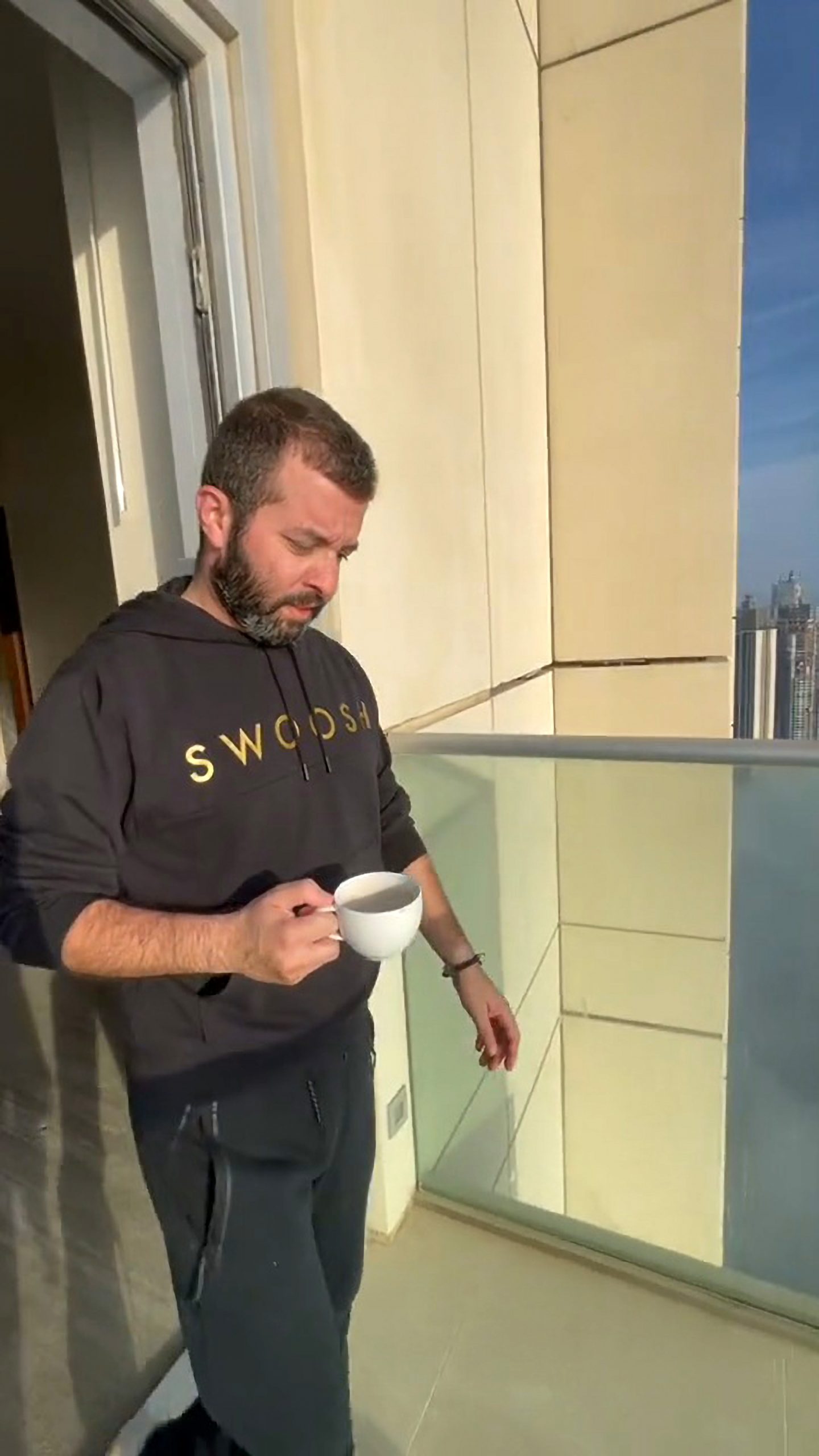 Read more about the article Viral Moment Man Sips Coffee In Clouds Amid Worlds Tallest Skyline