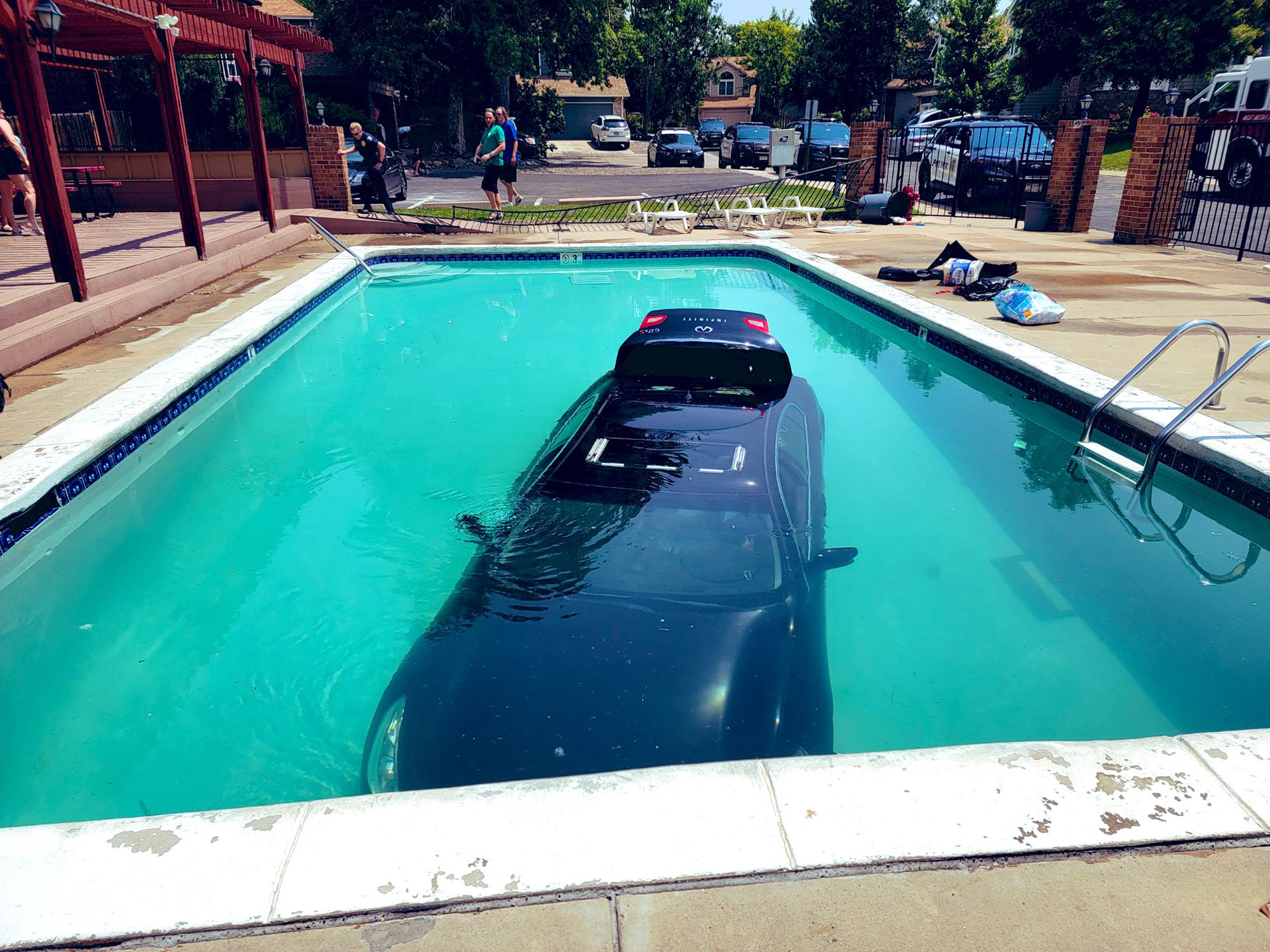 Read more about the article Car Fished Out Of Swimming Pool After Teen Driver Plunges In
