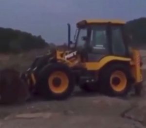 Read more about the article Moment Bulldozer Topples Into Fast Moving Floodwater As Rain Batters North Turkey