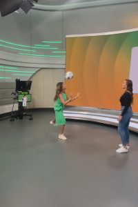 Read more about the article Viral Moment Hot Presenter And Female Footballer Show Off Footy Skills During Break In Filming