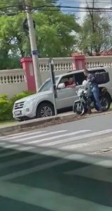 Read more about the article Road Rage Driver Tries To Run Over Motorbike Courier Who Belted Him With Helmet