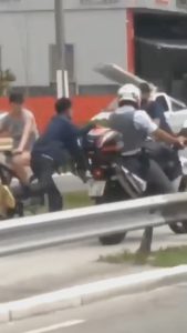 Read more about the article Outrage As Black Suspect Handcuffed To Cop Motorbike And Dragged Along Behind It