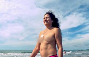Read more about the article Woman Fined For Walking Topless On Beach In Show Of Faith To UFO Religion