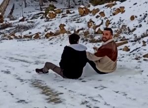 Read more about the article Hapless Student Ends Up In Icy Canal While Sliding Down Hill On Plastic Sheet