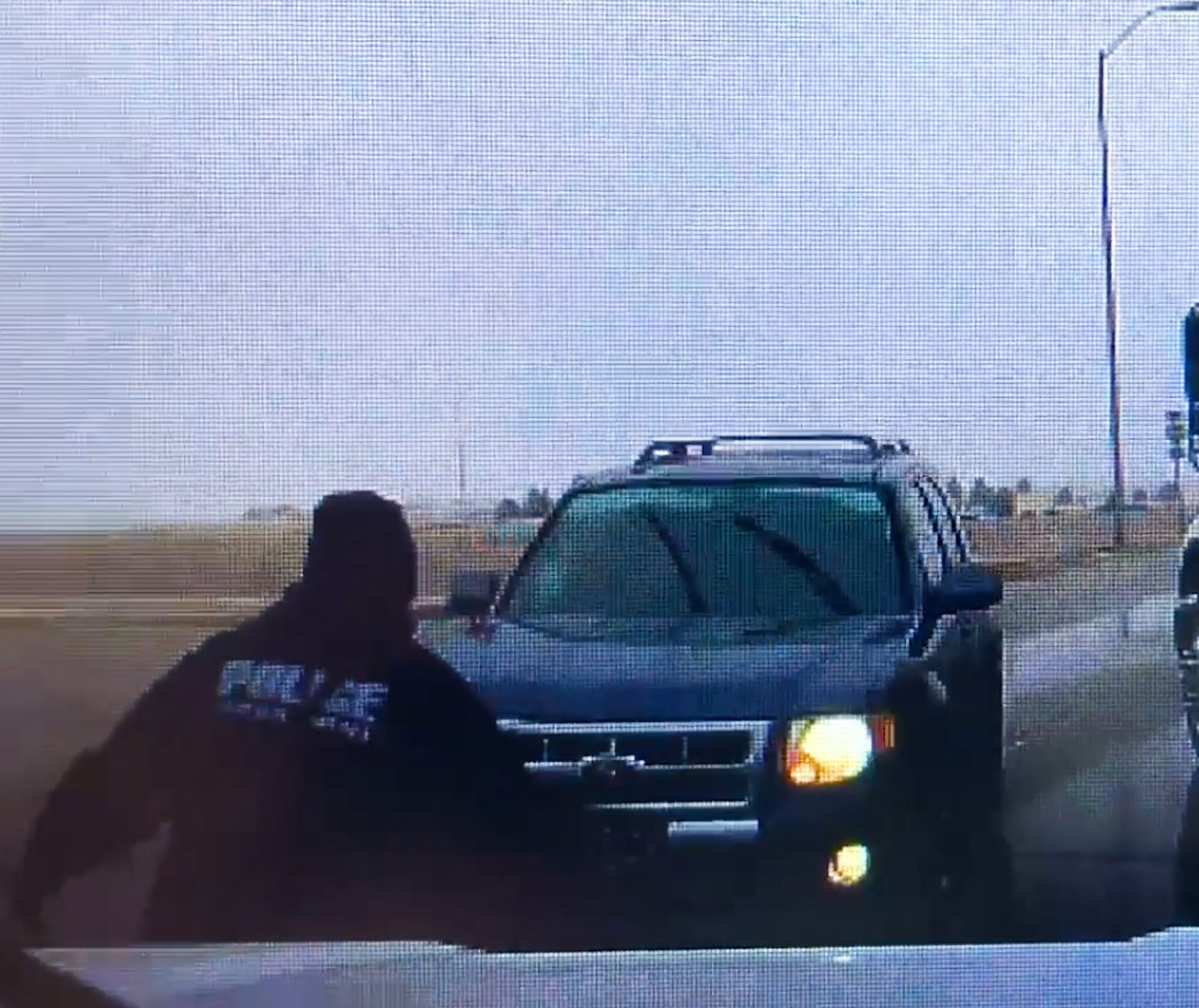 Read more about the article Moment South Dakota Police Officer Jumps Out Of Way In Nick Of Time As SUV Hurtles Towards Him On Slippery Road