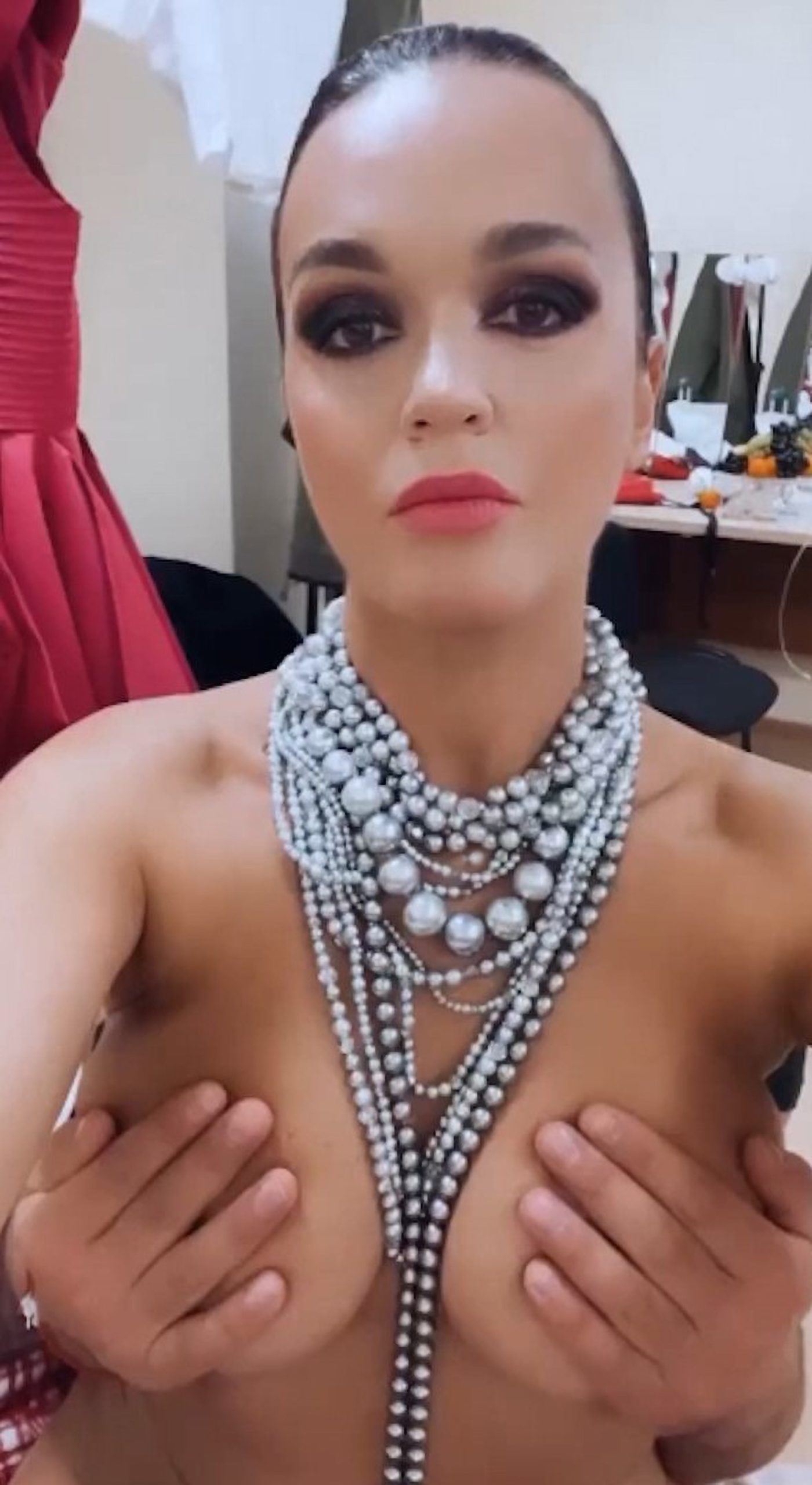 Read more about the article Russian Singer Sparks Outrage With Vid Of Man Cupping Her B00bs On Fatherland Day As She Wishes Followers World Peace