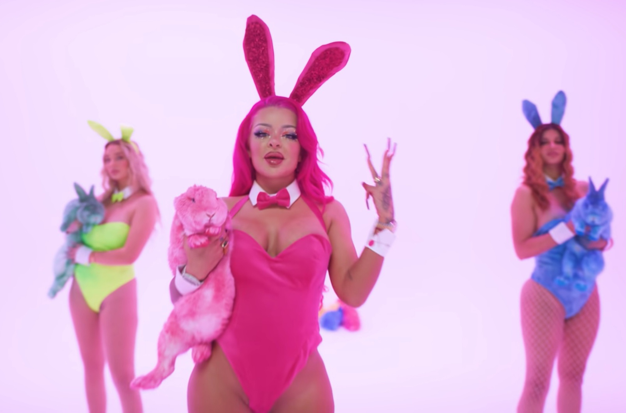 Read more about the article Gorgeous German Singer Outrages Animal Rights Groups With Raunchy Music Video With Dyed Rabbits