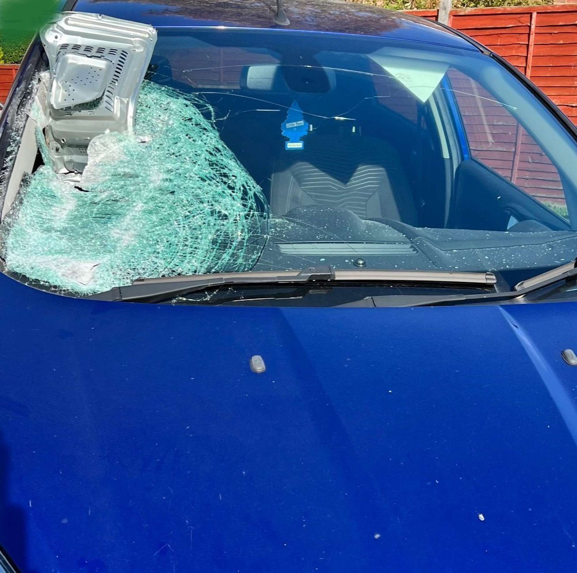 Read more about the article HOT WHEELS: Driver Hurt After Microwave Oven Thrown Through Front Windscreen