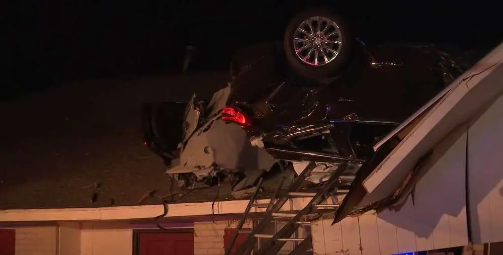 Read more about the article FRIGHT ON THE TILES: Car Crashes Into House Roof
