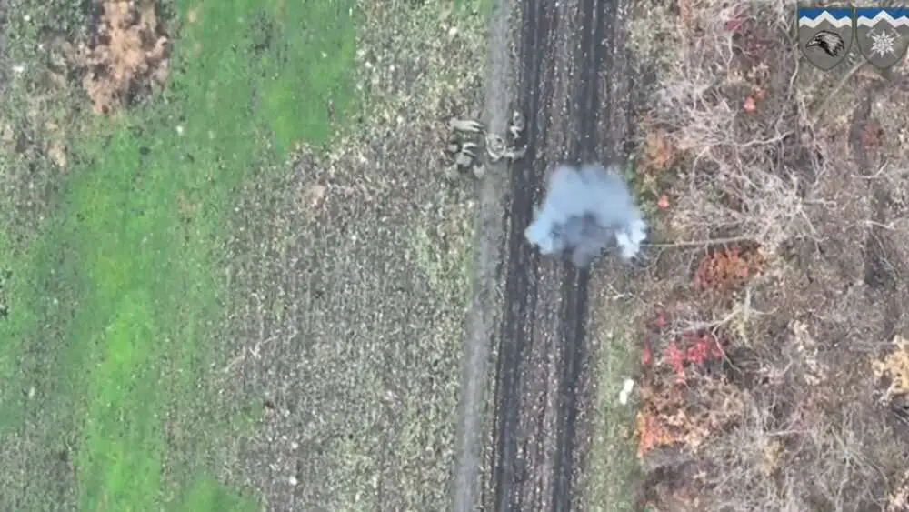 Read more about the article Ukrainian Drone Drops Bomb On Russian Soldiers