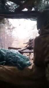 Read more about the article Ukrainian Machine Gunner Fires At Russian Enemy From Camouflaged Dugout