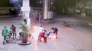 HOT FOOTING IT: Moment Biker’s Shoes Catch Fire At Petrol Station