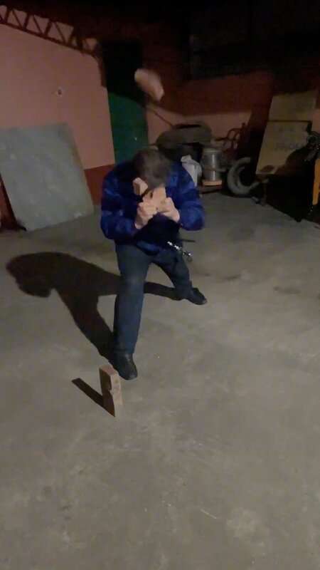 Read more about the article IRON HEAD KUNG FU: Man Shows Off By Smashing Bricks With Head