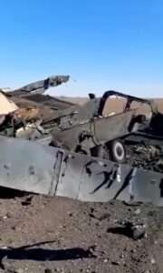 Read more about the article Ukrainian Soldier Shows Off Remains Of Destroyed Russian Battle Tank